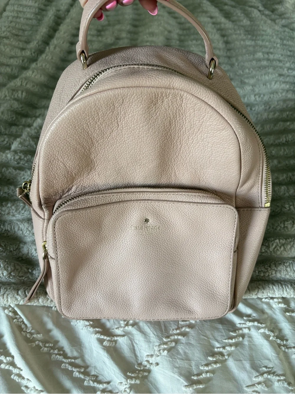 Kate Spade Light Pink Pebbled Leather Mini Backpack